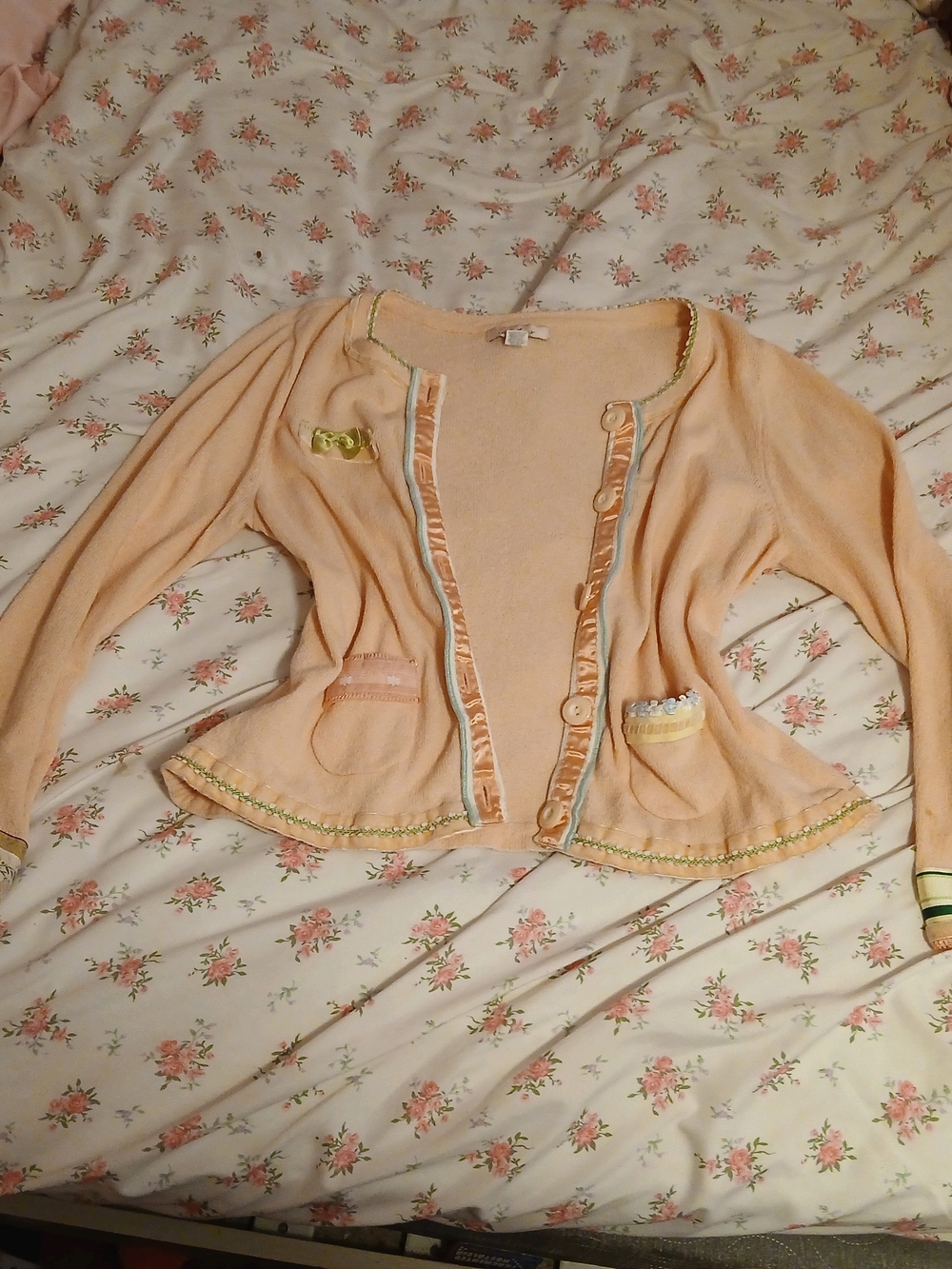 Pink Intuitions cardigan with ribbons and embroidery